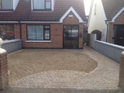Autumn mix gravel with brick paved path and apron