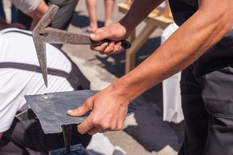 Worker,Produces,Roofing,Slate,Using,A,Slate,Hammer Worker,Produces,Roofing,Slate,Using,A,Slate,Hammer
